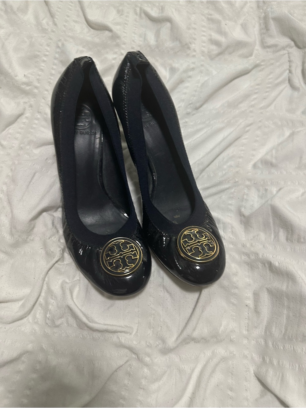 Tory Burch Navy Patent Logo Toe Heels with Gold Medallion